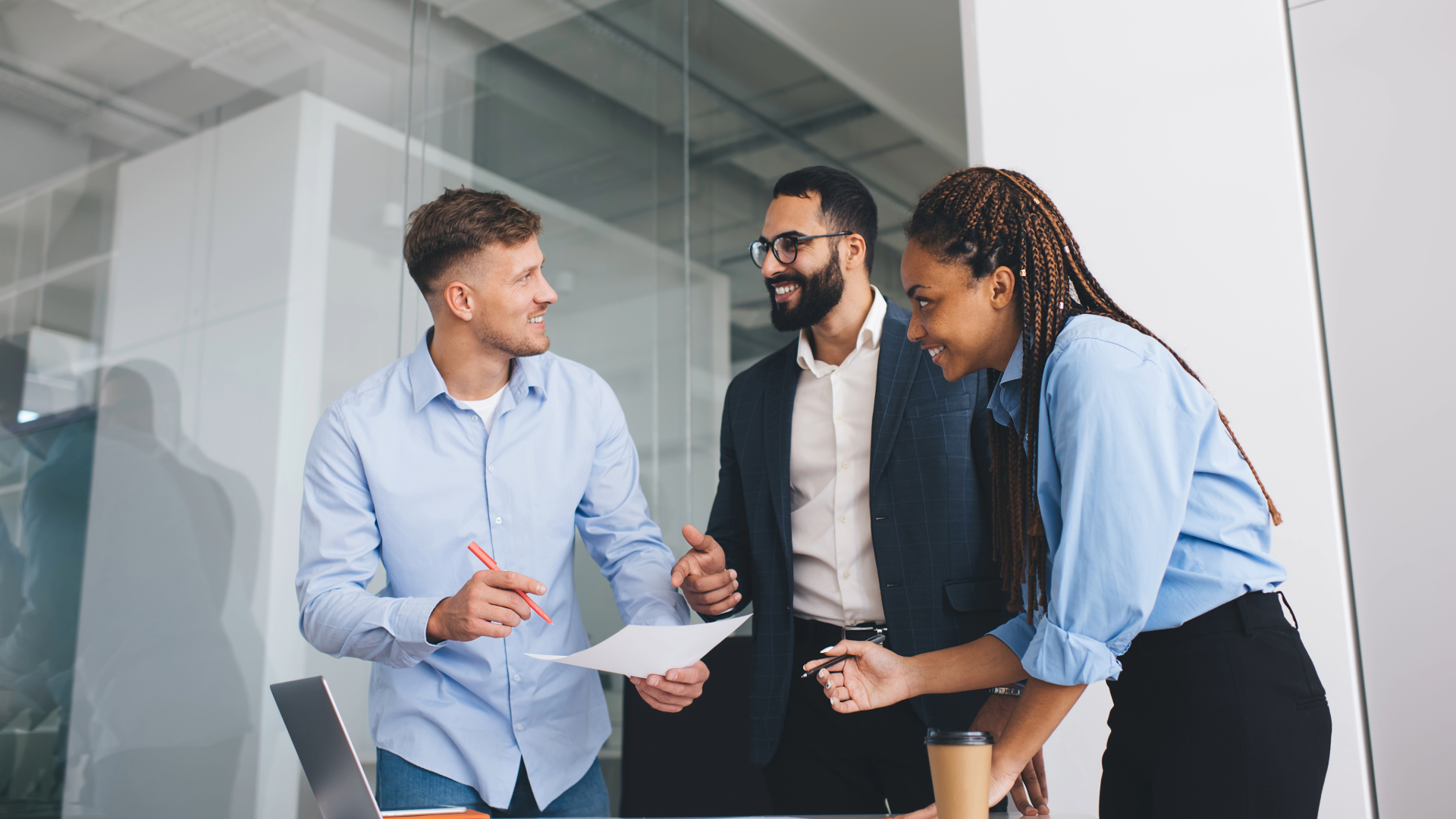 colleagues collaborating together in an office environment